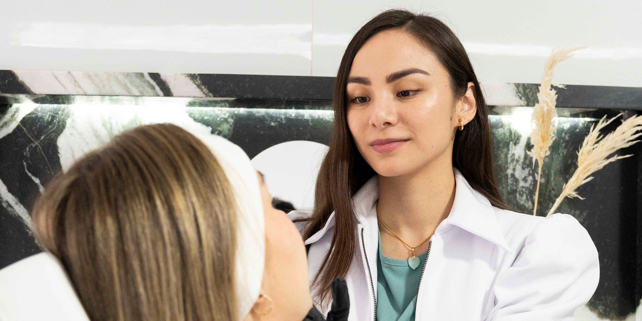 A doctor doing a check up on a patient. 