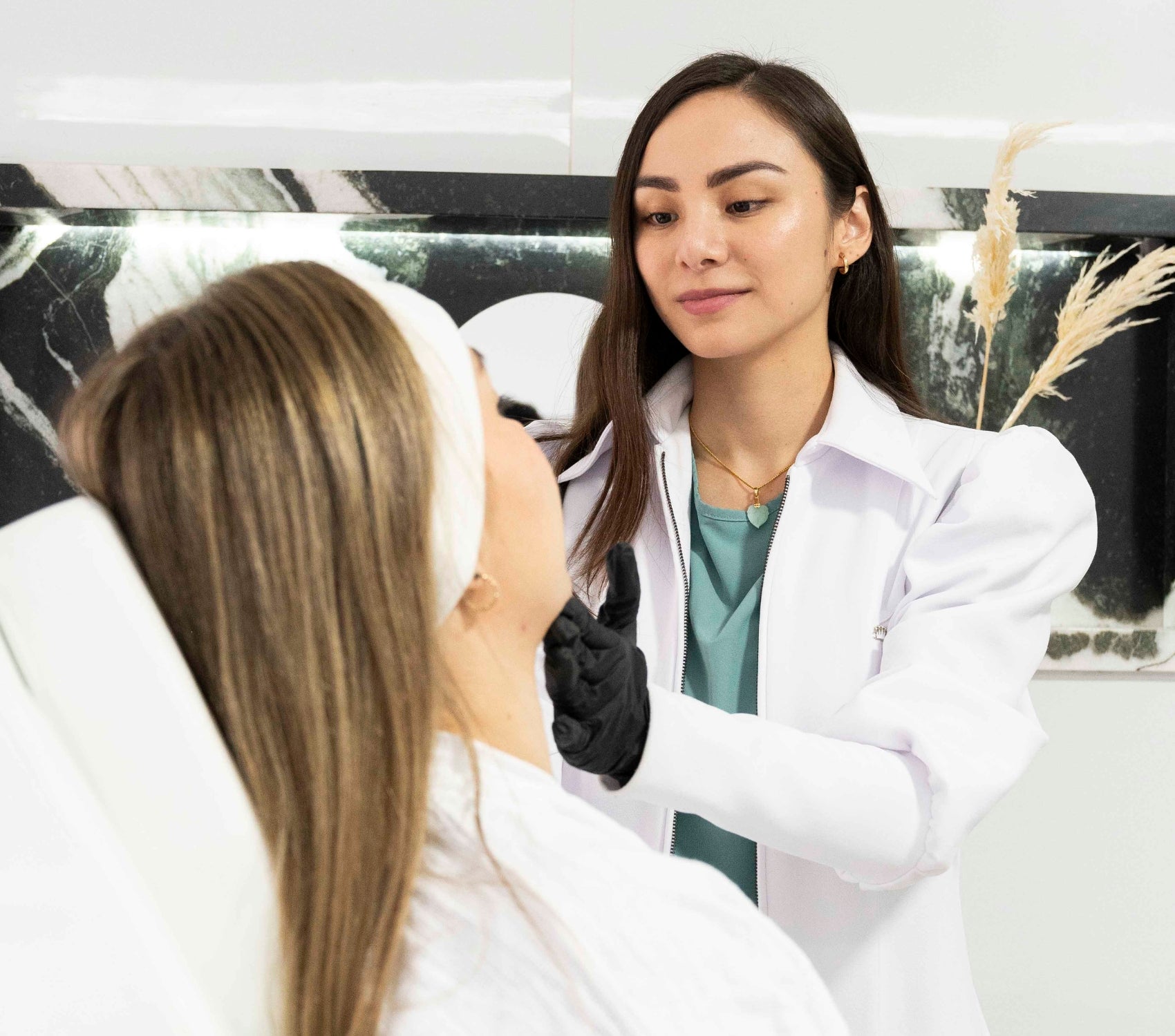 A doctor doing a check up on a patient. 