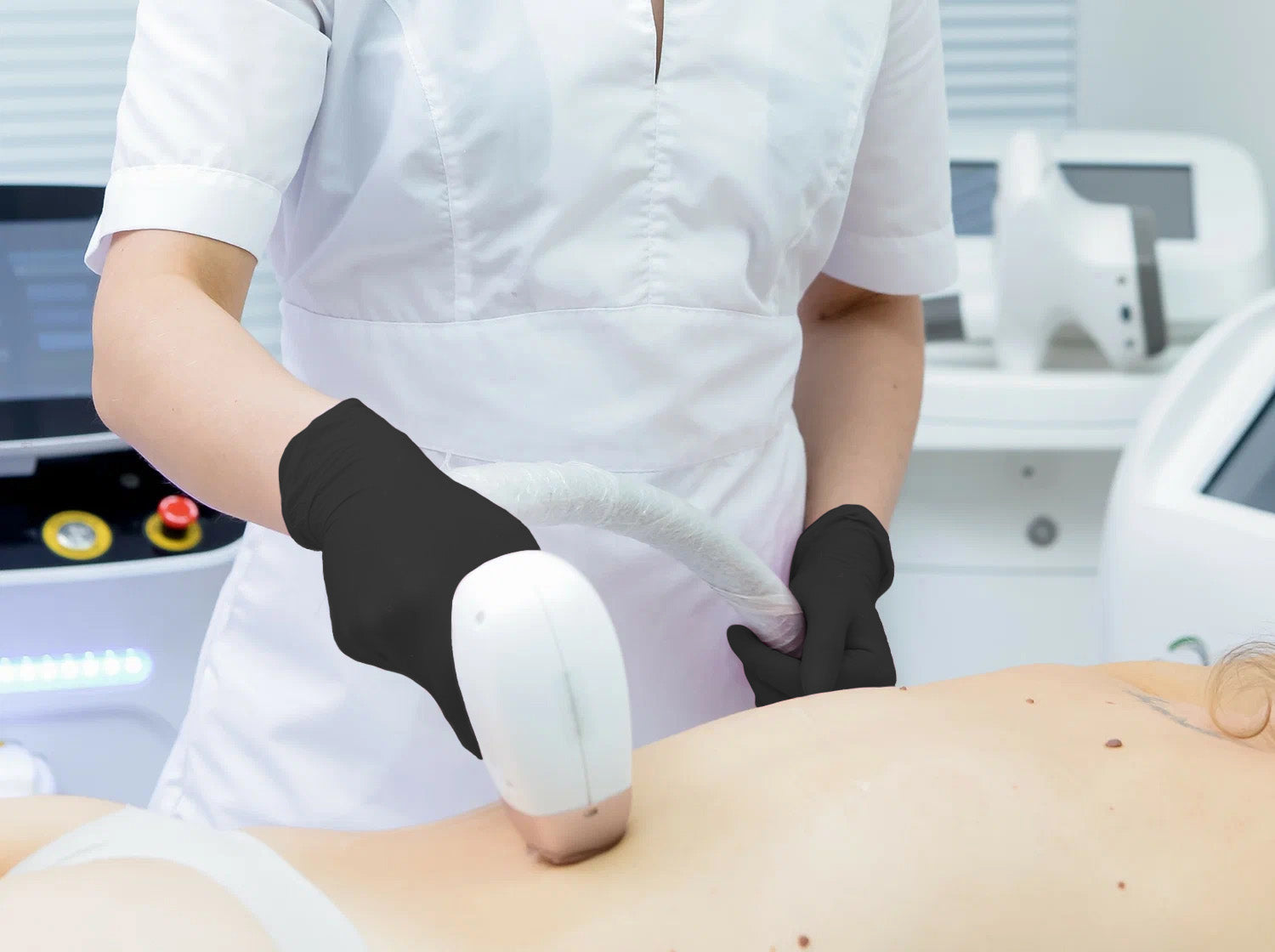 A person receiving laser hair removal on their back.