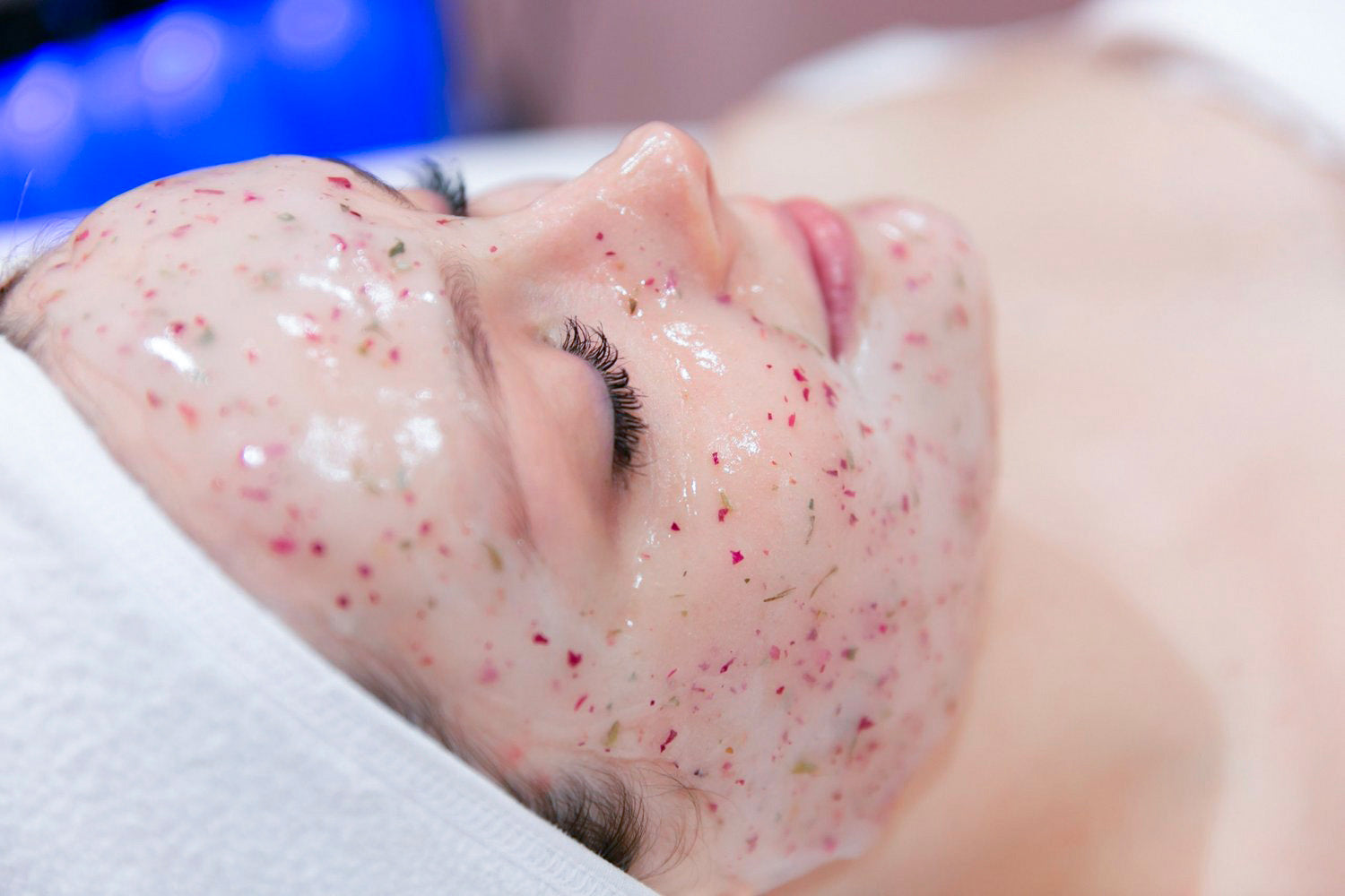 Close up of the face of a woman recieving an Egyptian Rose Facial.