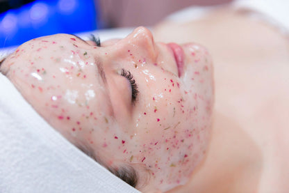 Close up of the face of a woman recieving an Egyptian Rose Facial.